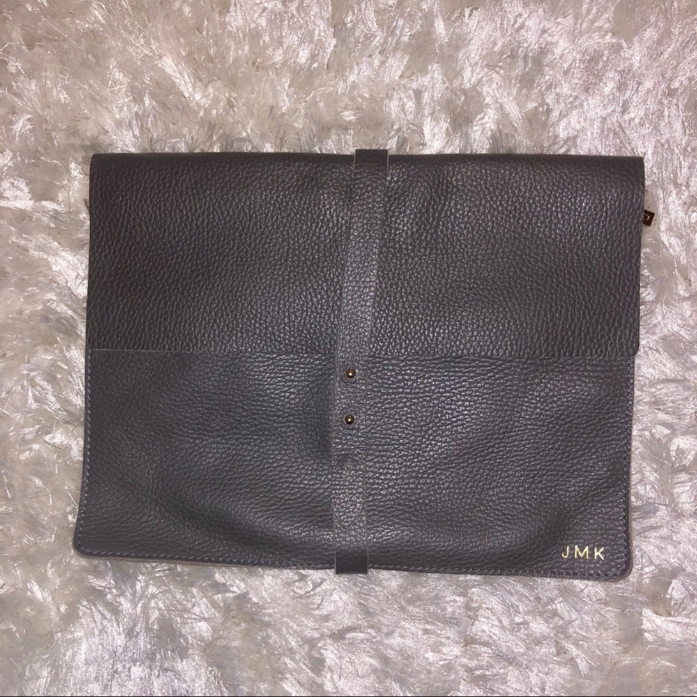 Rare and discontinued Cuyana tech sleeve clutch